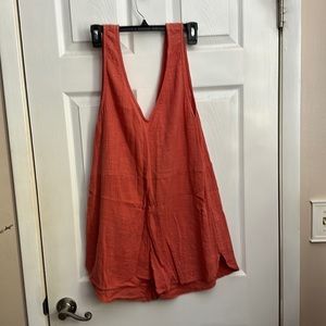 Rip curl shorts, jumper, and burnt orange